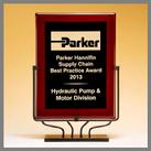 red black art glass with stand plaque award