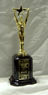 Achievement figure on piano finish rosewood base